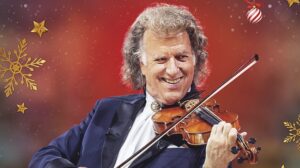 André Rieu playing the violin in a promotional image for White Christmas