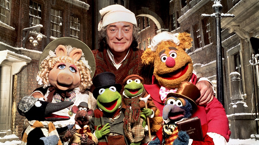 Miss Piggy, Rizzo the Rat, Kermit the Frog, Michael Caine, Fozzy Bear and Gonzo in The Muppet's Christmas Carol