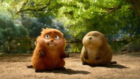 Two animated beavers stand against a forest background in a still from Disney and Pixar's Hoppers