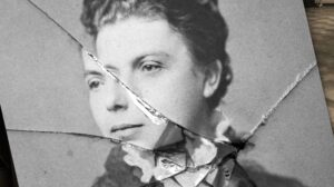 A photograph of a person is cracked in the middle in a promotional image for Elysium Theatre Company's Ghosts